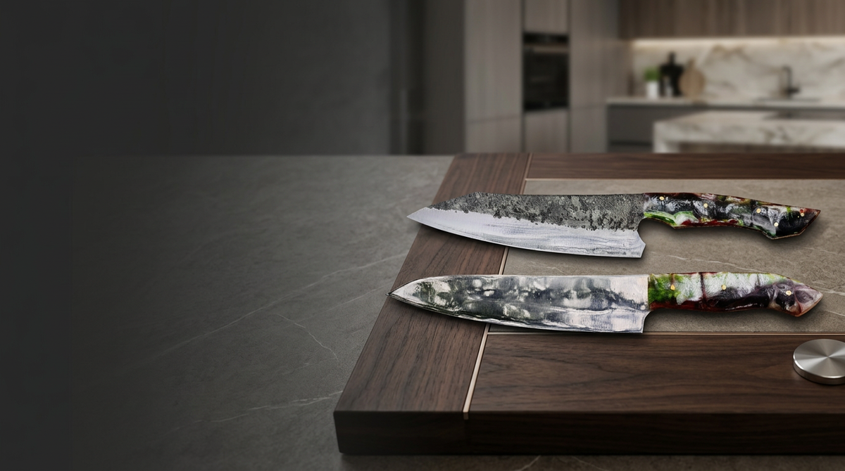Three Damascus, high-carbon, and D2 steel kitchen knives compared side by side on a dark surface