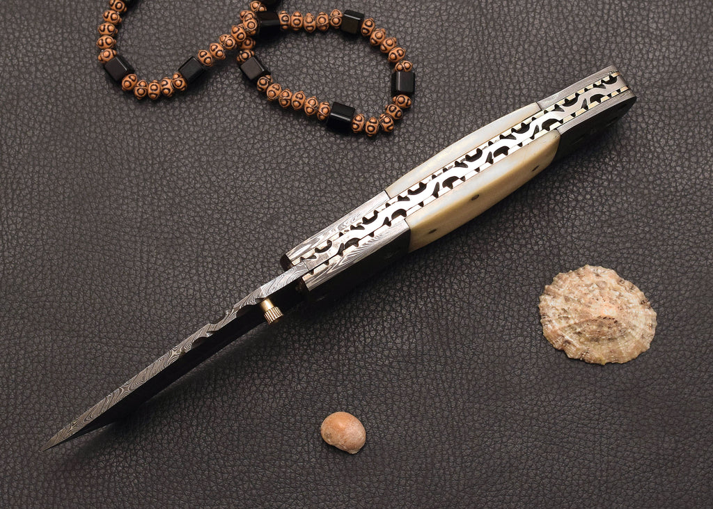 Driftbone Damascus folding EDC knife with cream bone handle