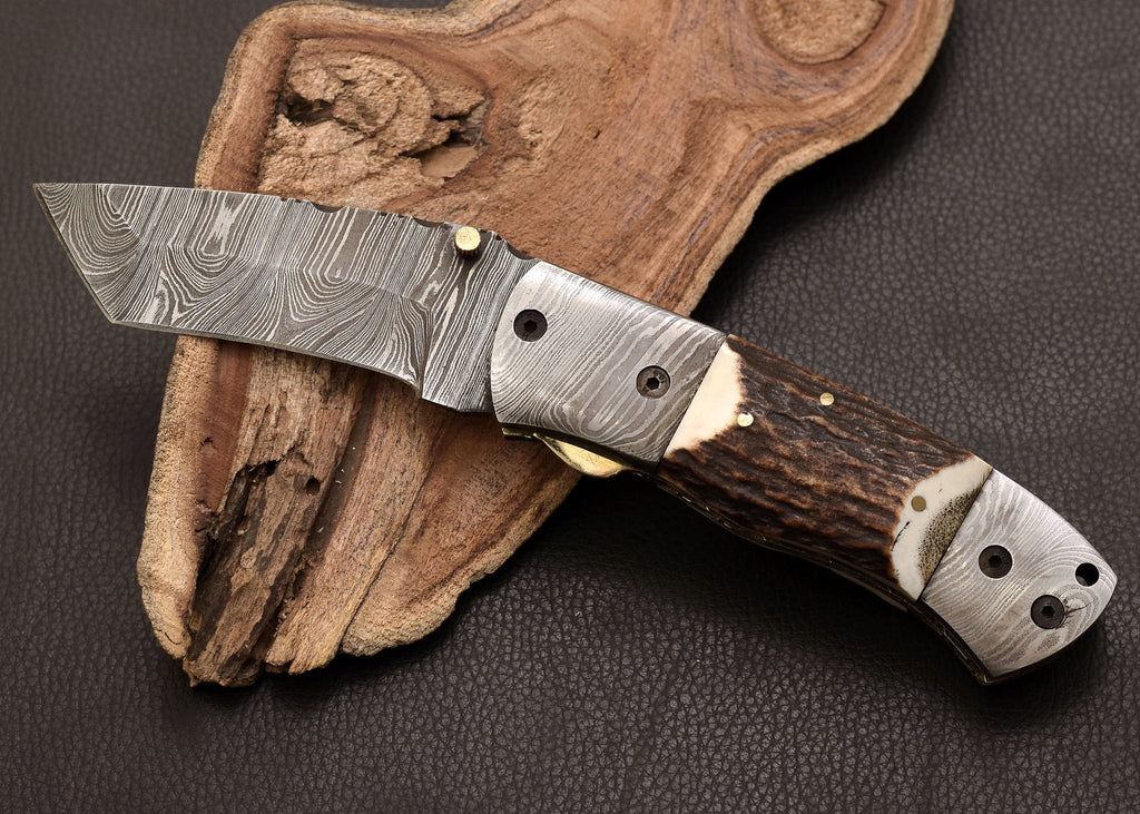 Stag Ridge Damascus folding knife with stag antler handle