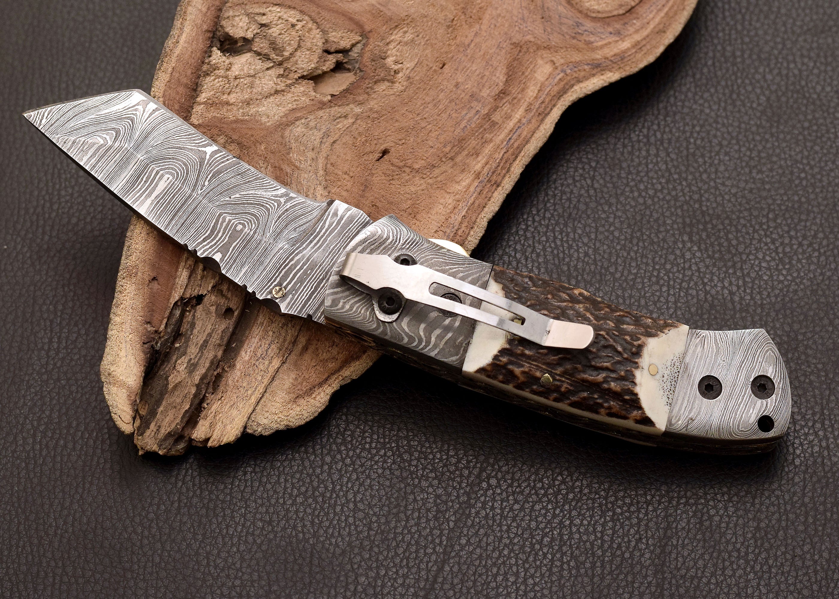 Stag Ridge Damascus folding knife with stag antler handle
