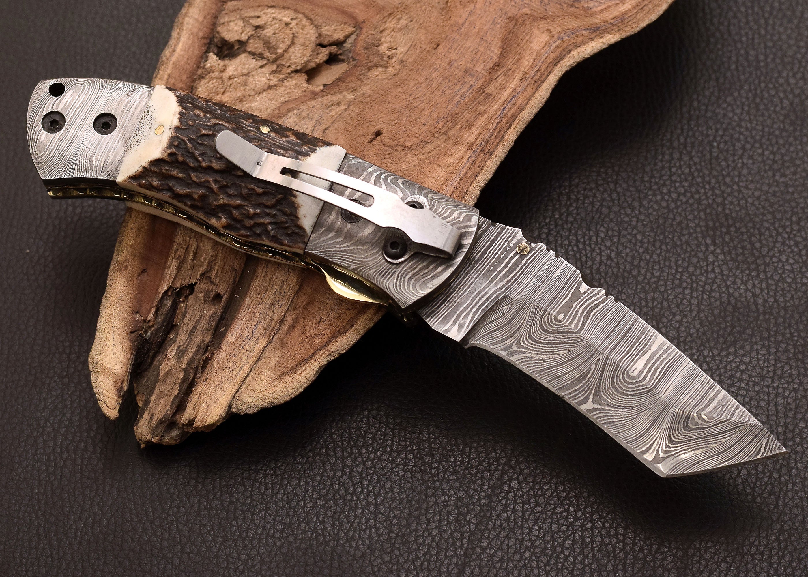 Stag Ridge Damascus folding knife with stag antler handle