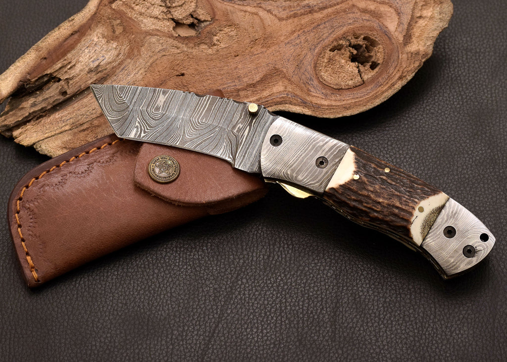 Stag Ridge Damascus folding knife with stag antler handle
