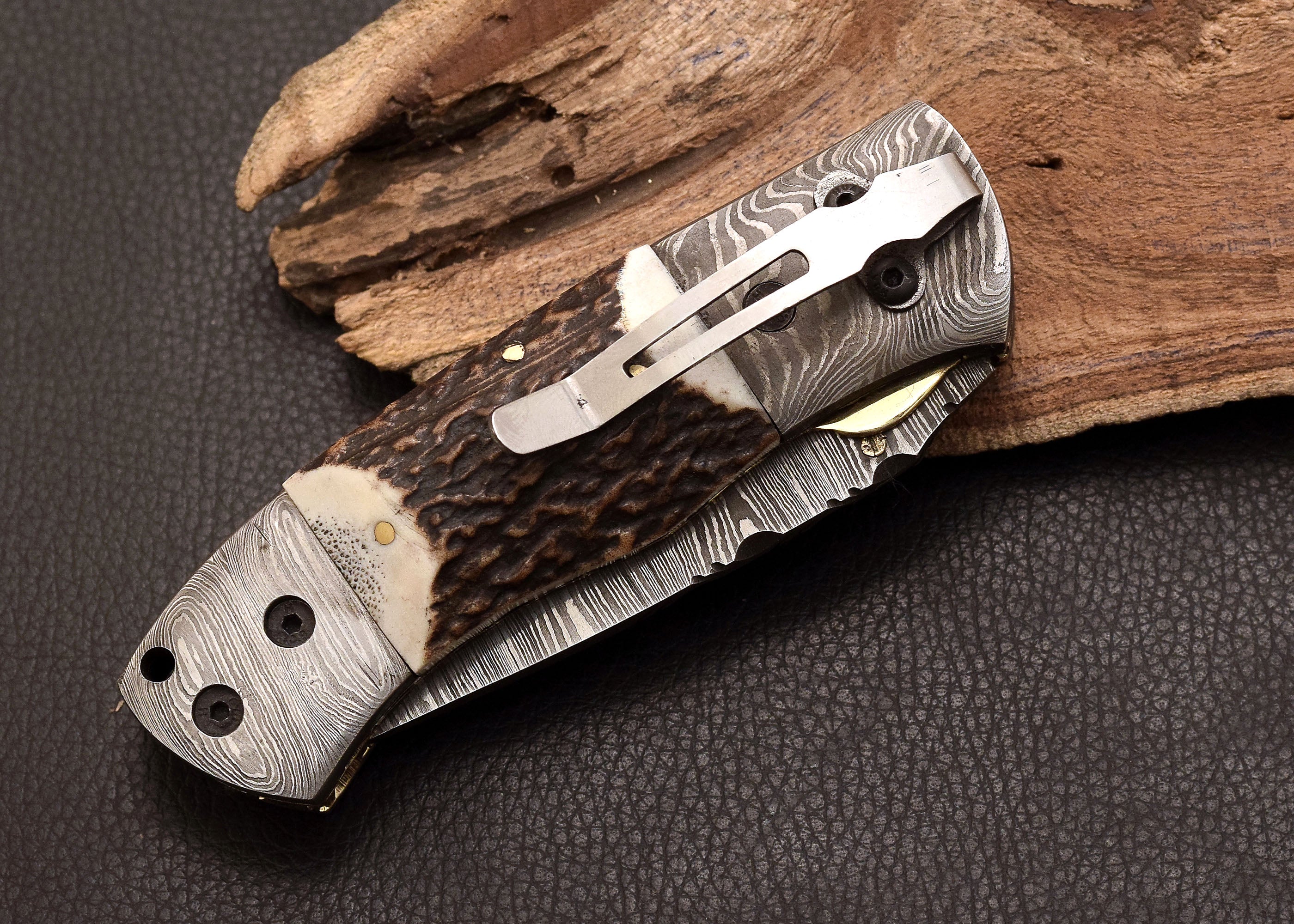 Stag Ridge Damascus folding knife with stag antler handle