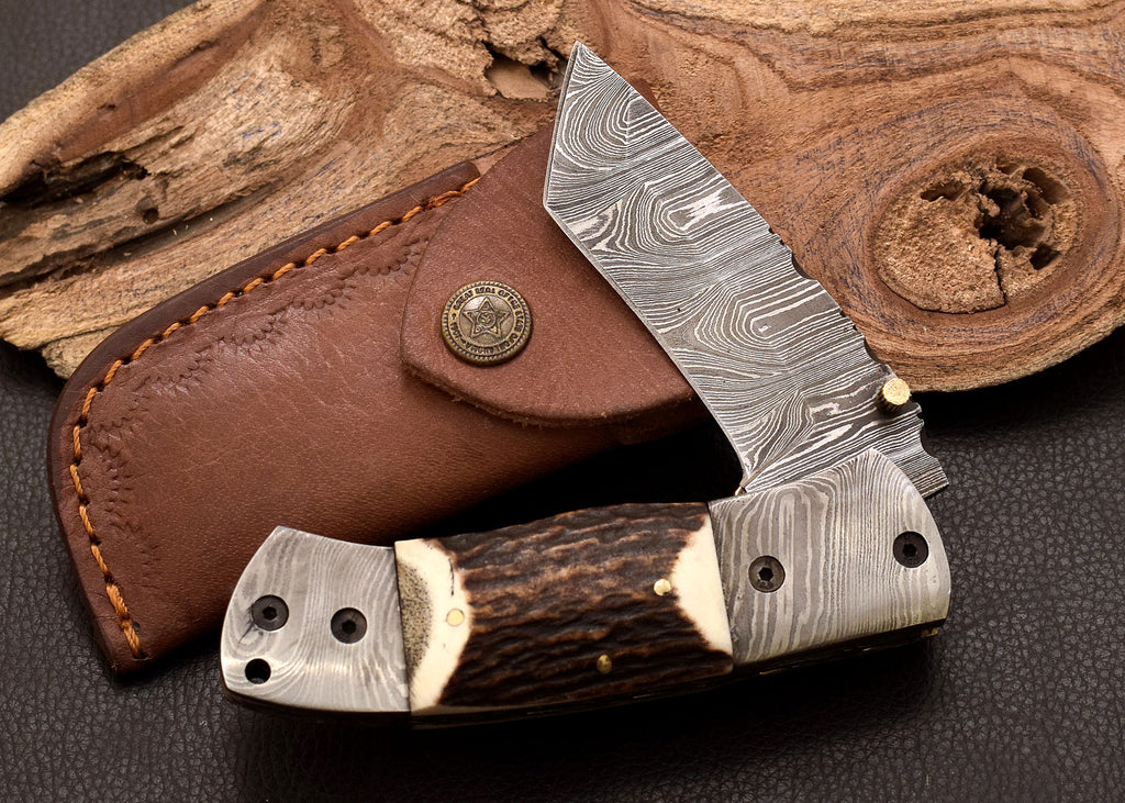 Stag Ridge Damascus folding knife with stag antler handle