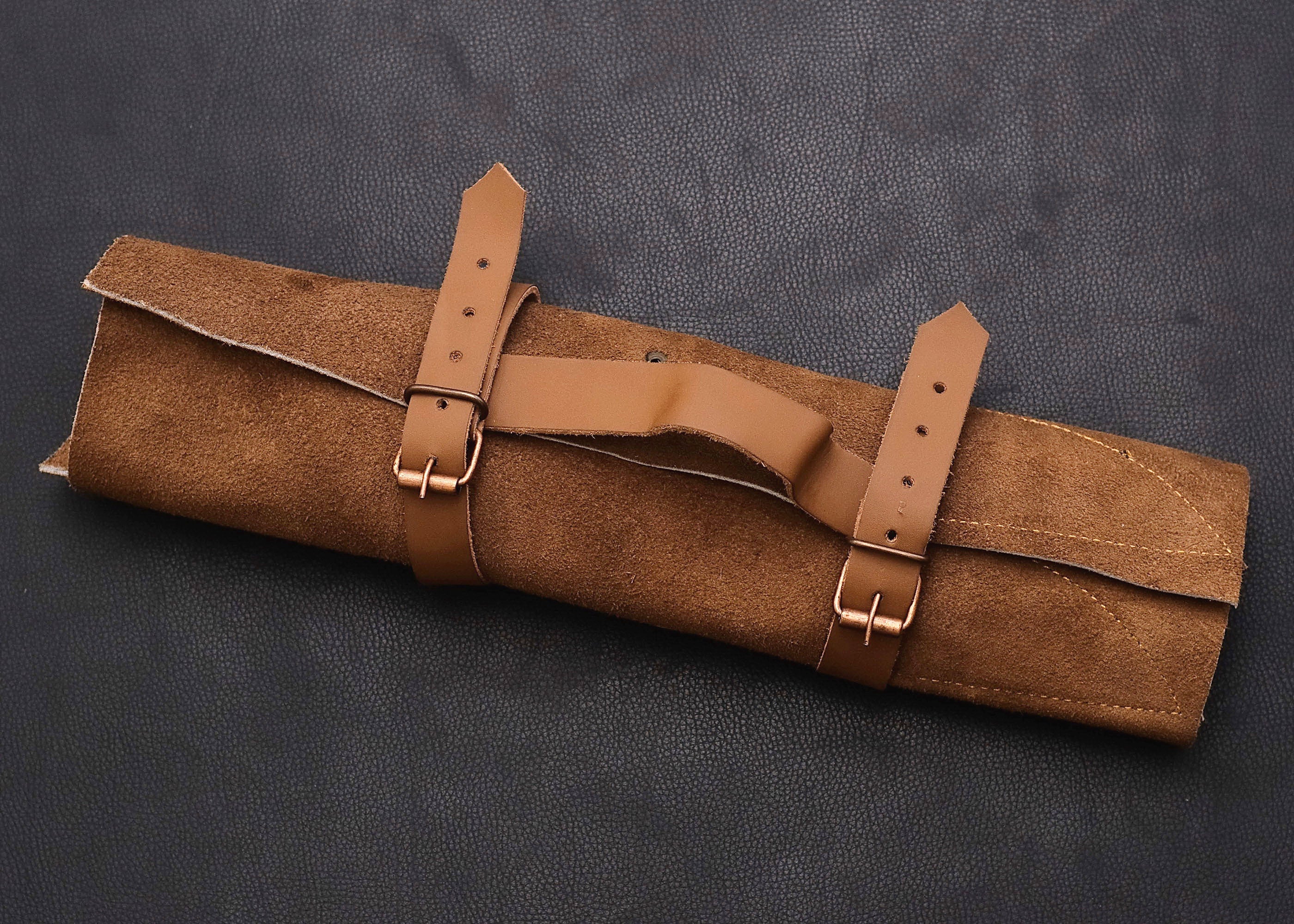 Hand-forged Damascus chef knife set rolled in a stitched leather carry case