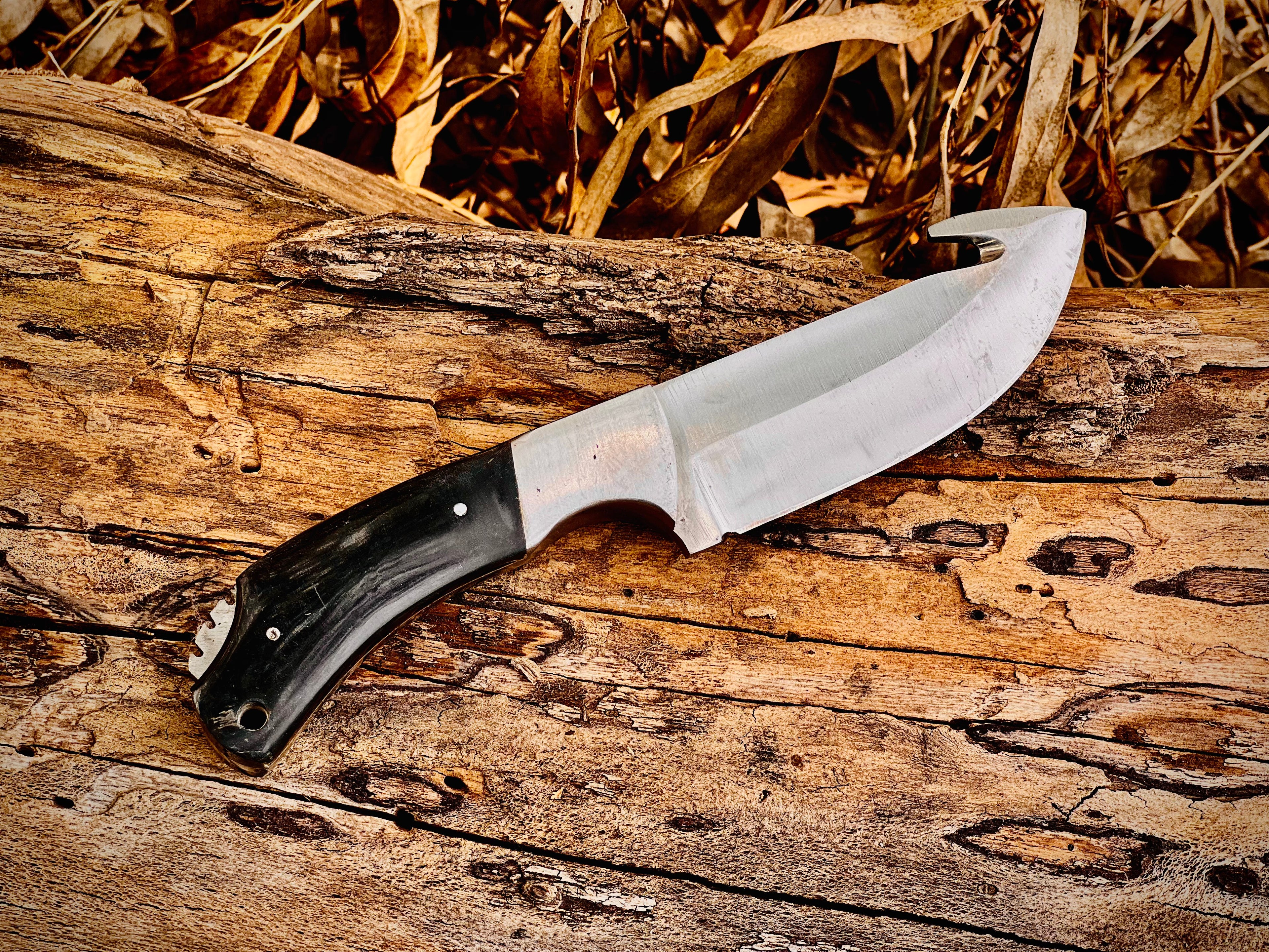 3-piece gut hook skinning knife set with black horn handles