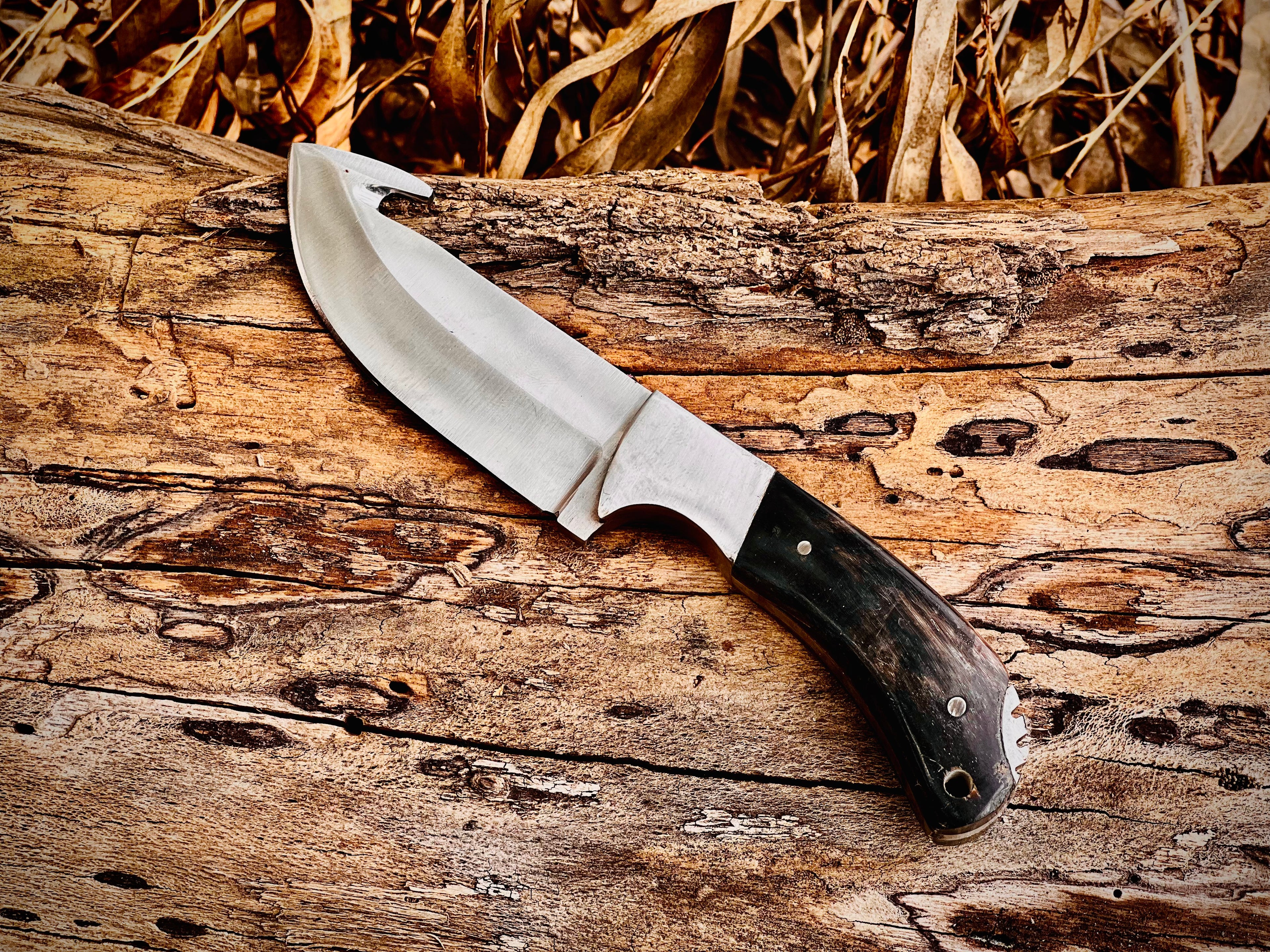 3-piece gut hook skinning knife set with black horn handles