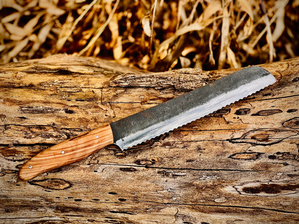 Forged serrated bread knife with olive wood handle