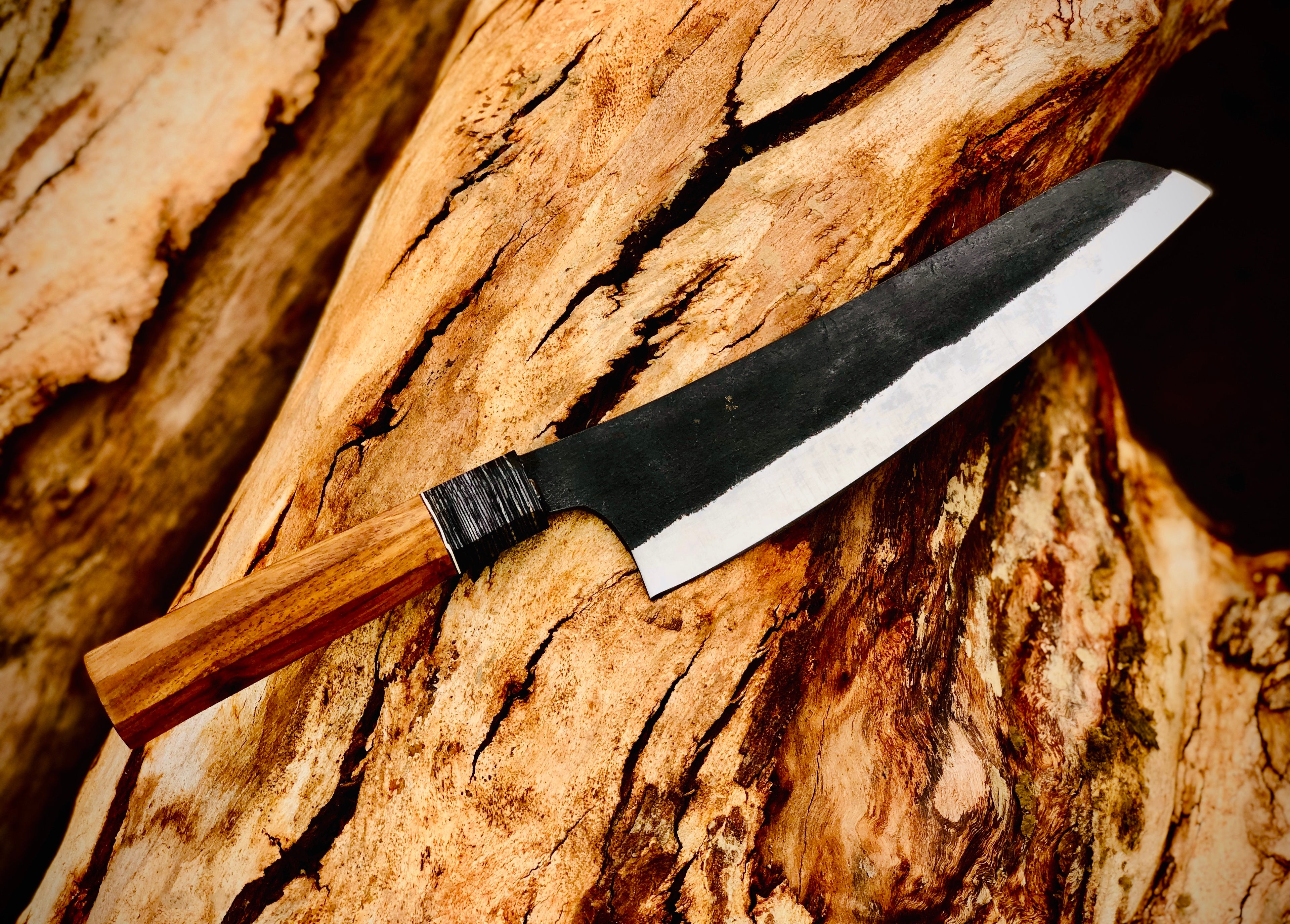 Forged chef knife with wire-wrapped wood handle