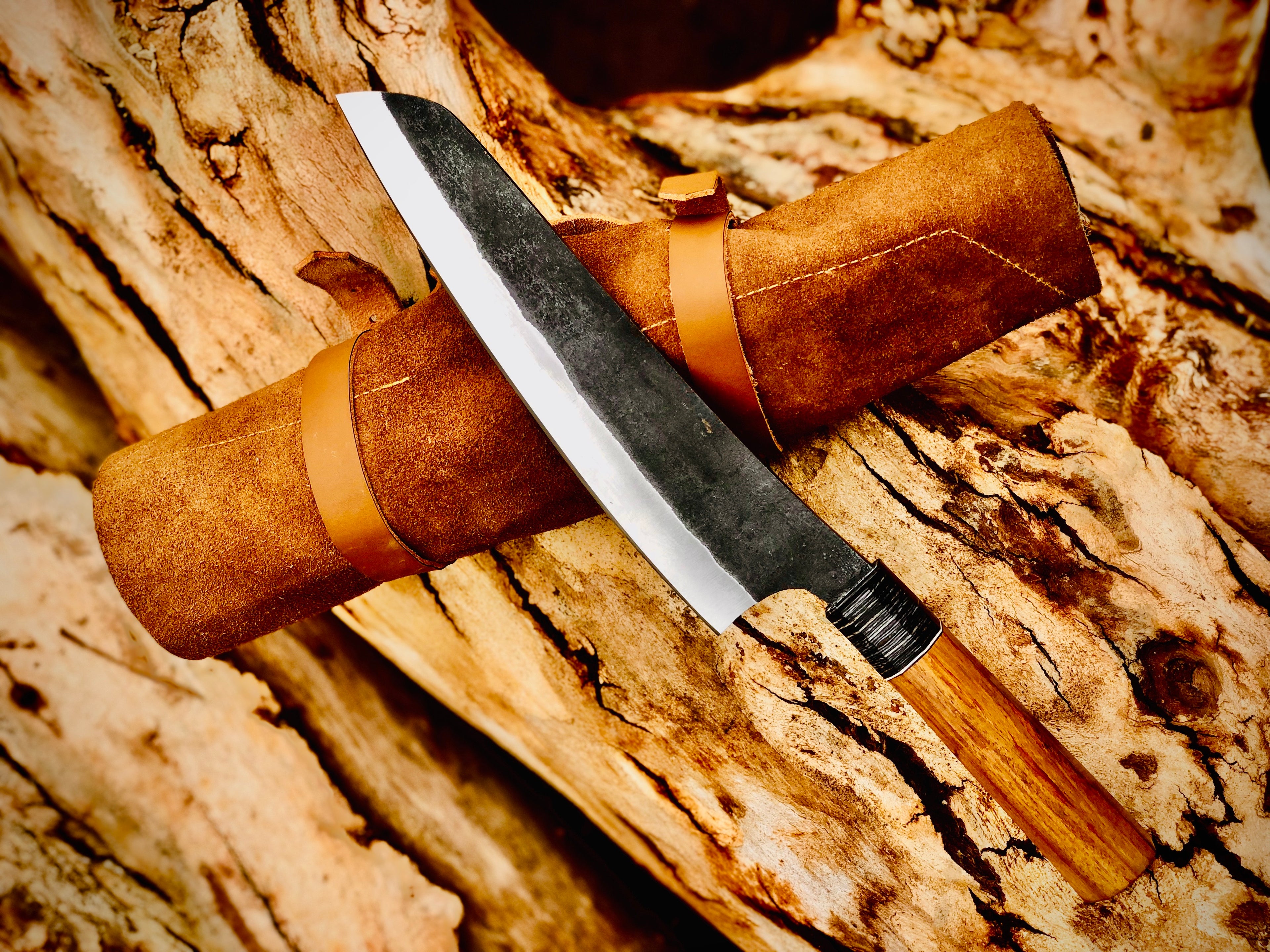 Forged chef knife with wire-wrapped wood handle