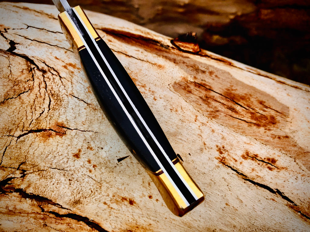 Ironvale lockback folding knife with ebony handle and brass bolsters