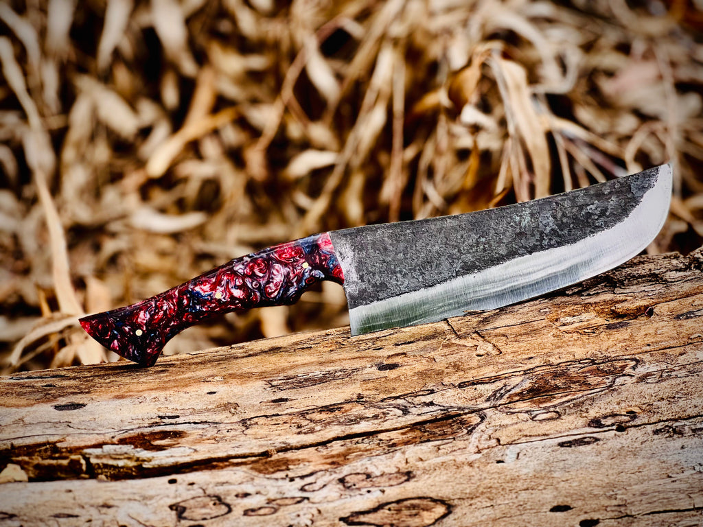 Forged chef knife with galaxy resin handle and hamon line