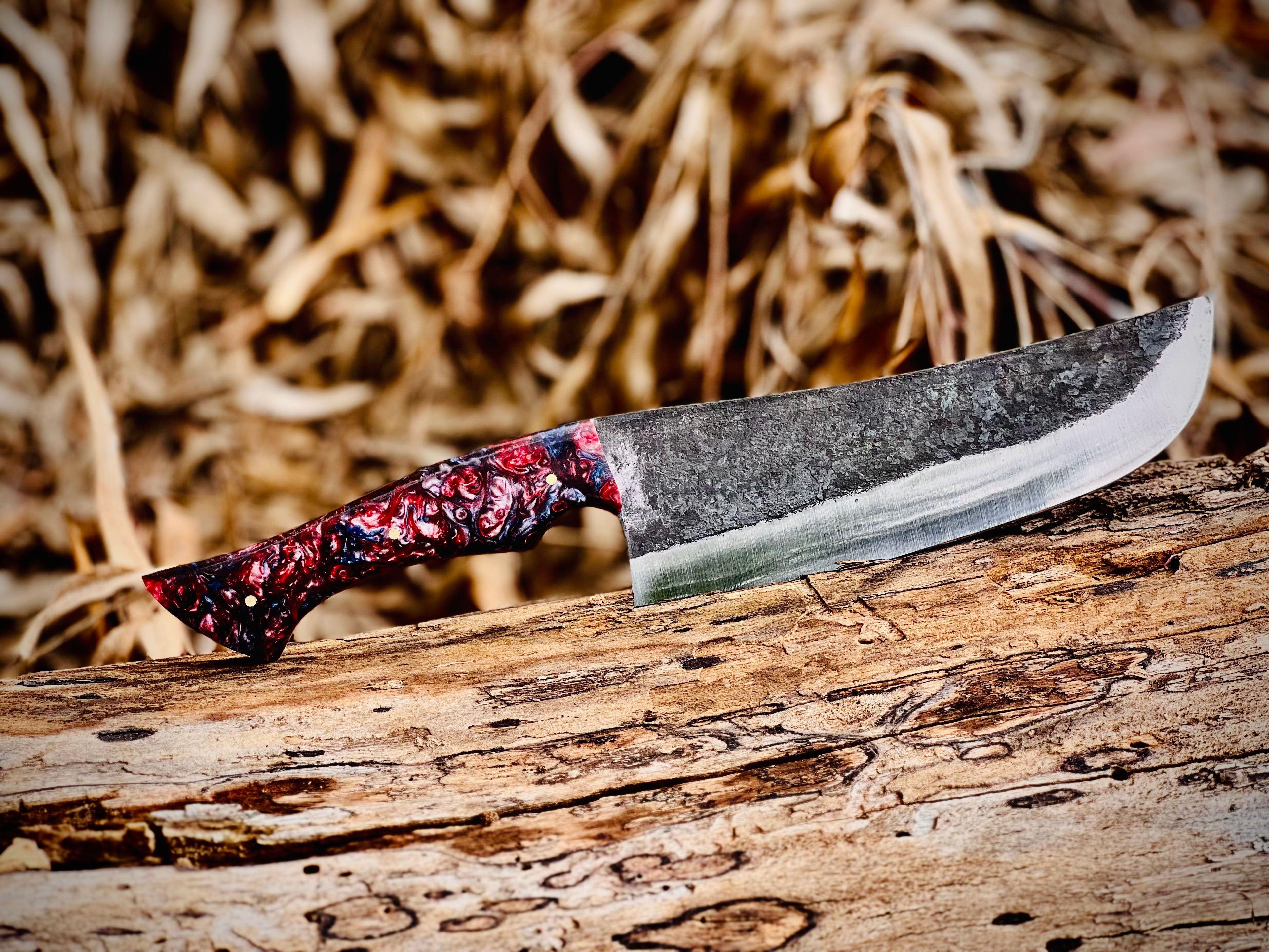 Forged chef knife with galaxy resin handle and hamon line