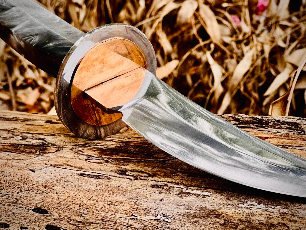 Obsidian hook-blade skinning knife with black handle