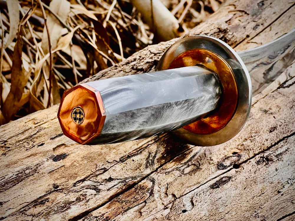 Obsidian hook-blade skinning knife with black handle