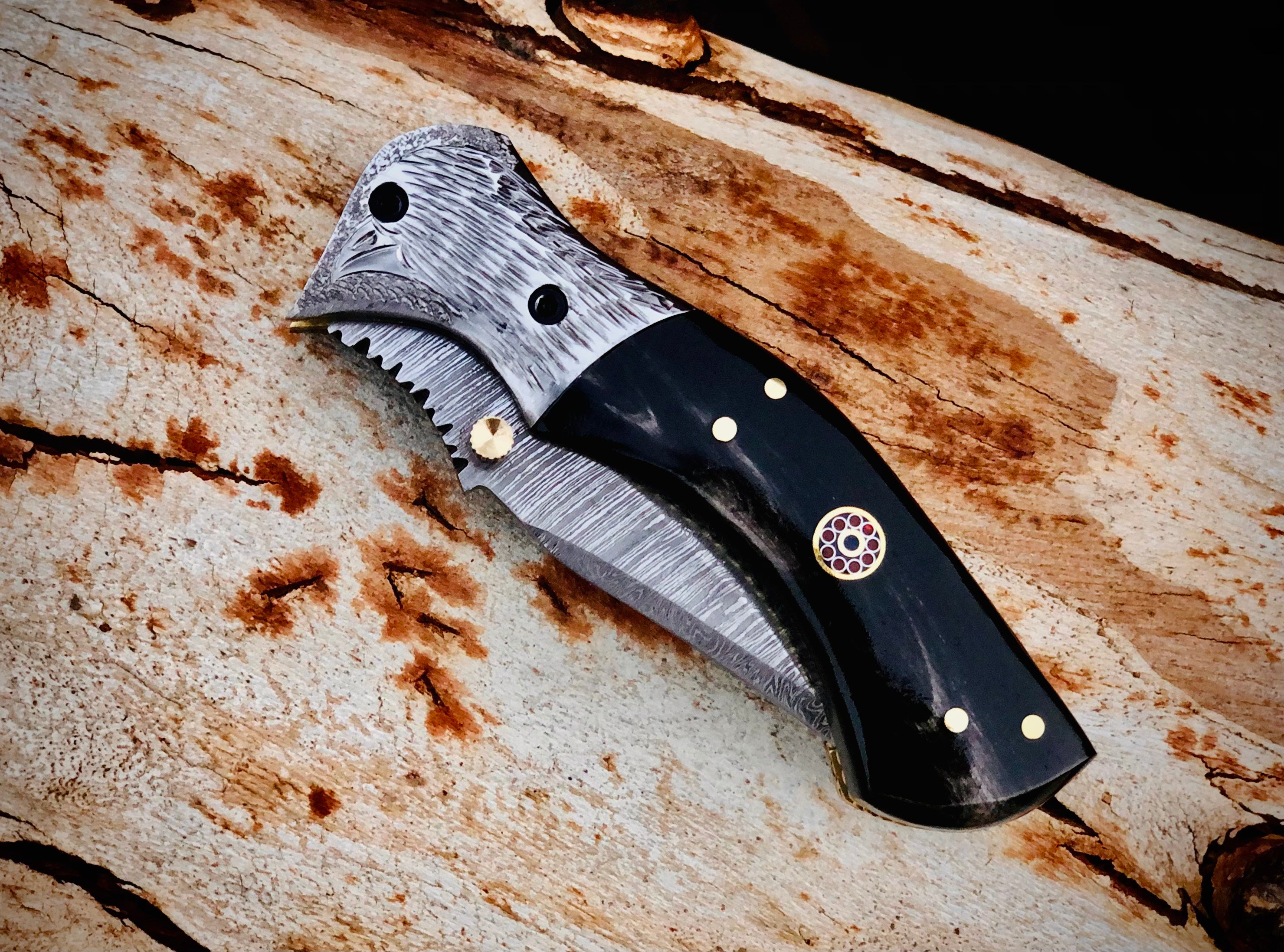 Ember Rose Damascus folding knife with gemstone rosette inlay