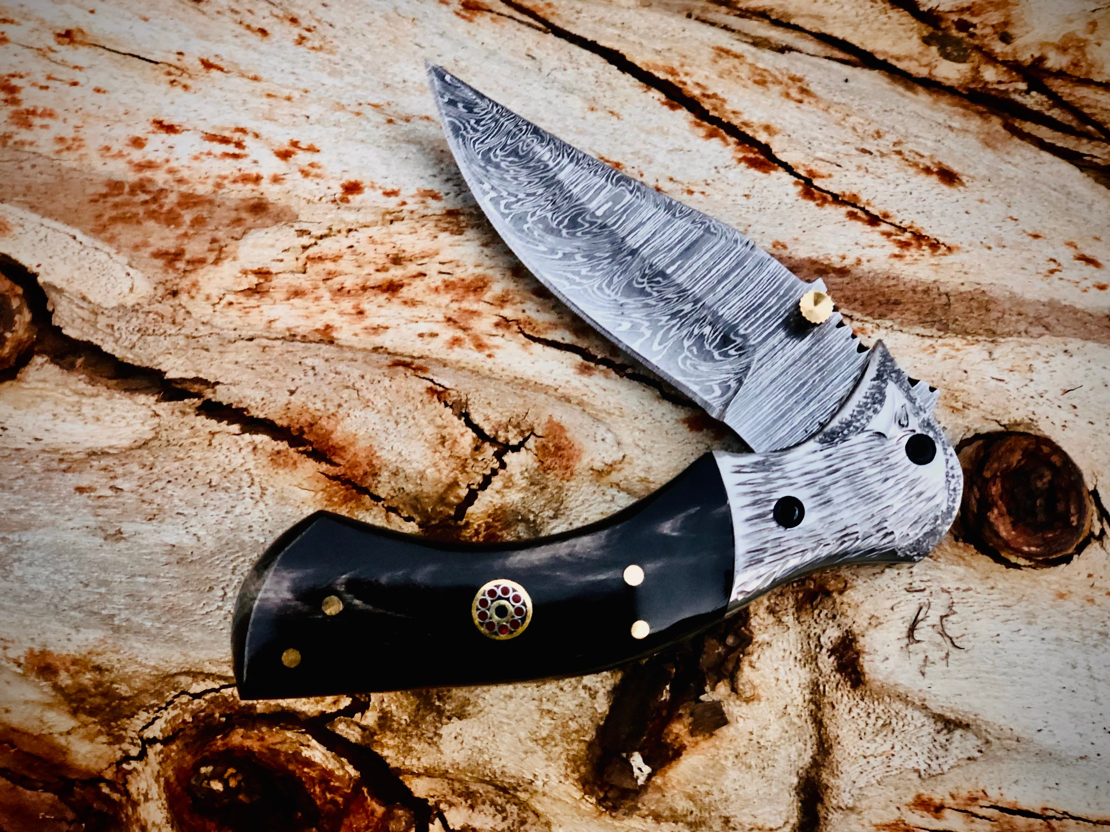 Ember Rose Damascus folding knife with gemstone rosette inlay