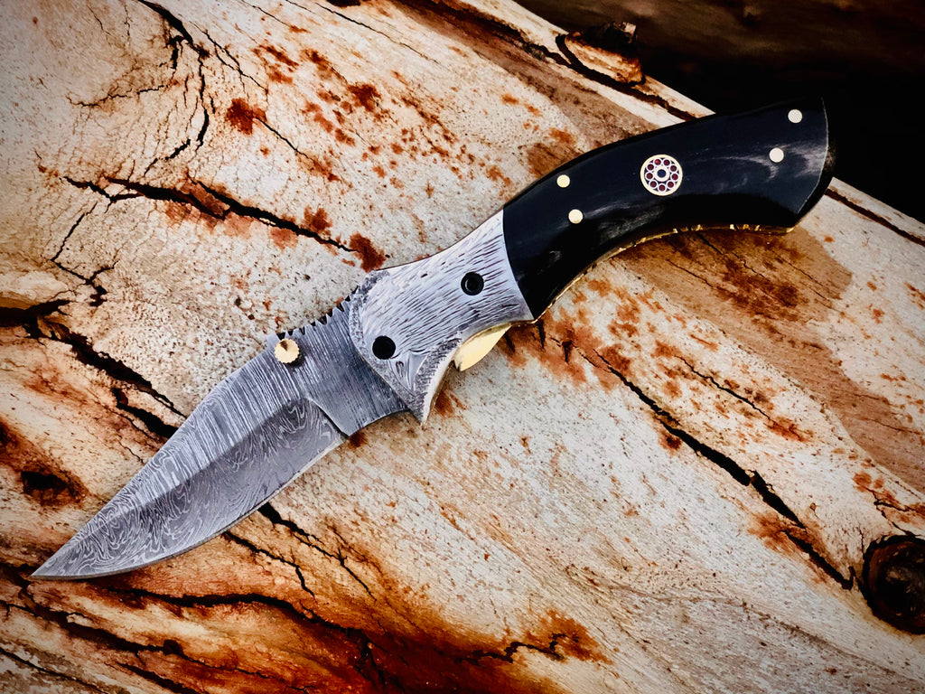 Ember Rose Damascus folding knife with gemstone rosette inlay