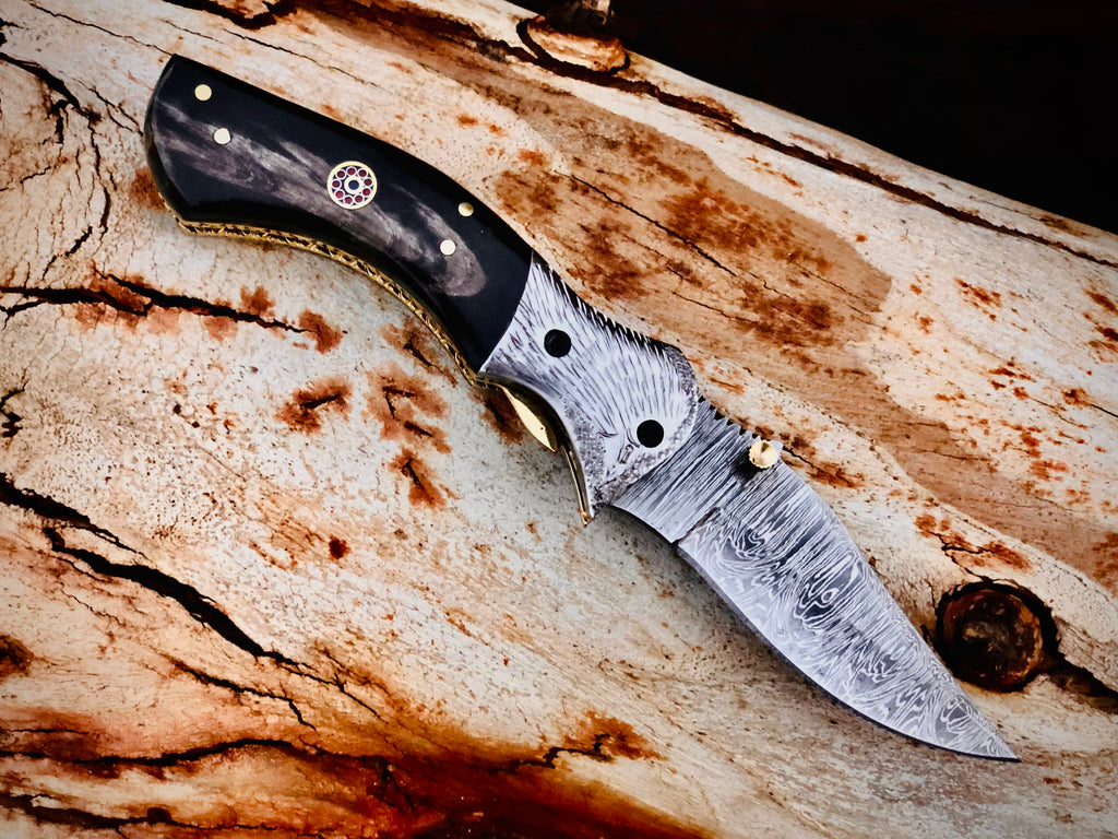 Ember Rose Damascus folding knife with gemstone rosette inlay
