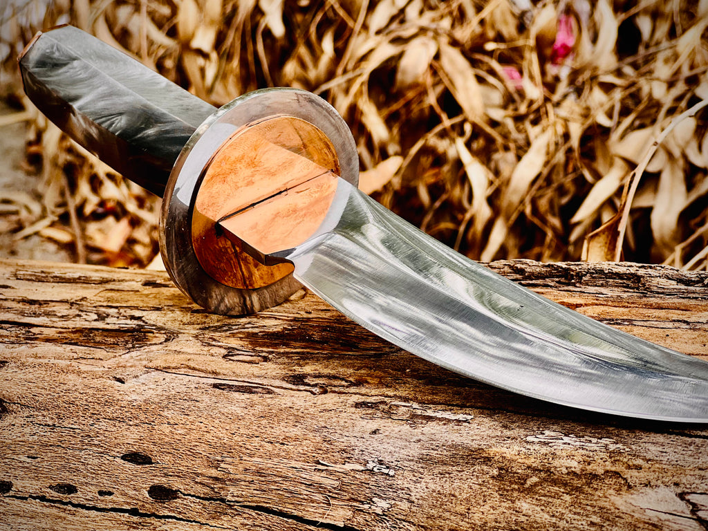 Obsidian hook-blade skinning knife with black handle