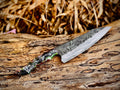 Forged chef knife with red and green resin handle