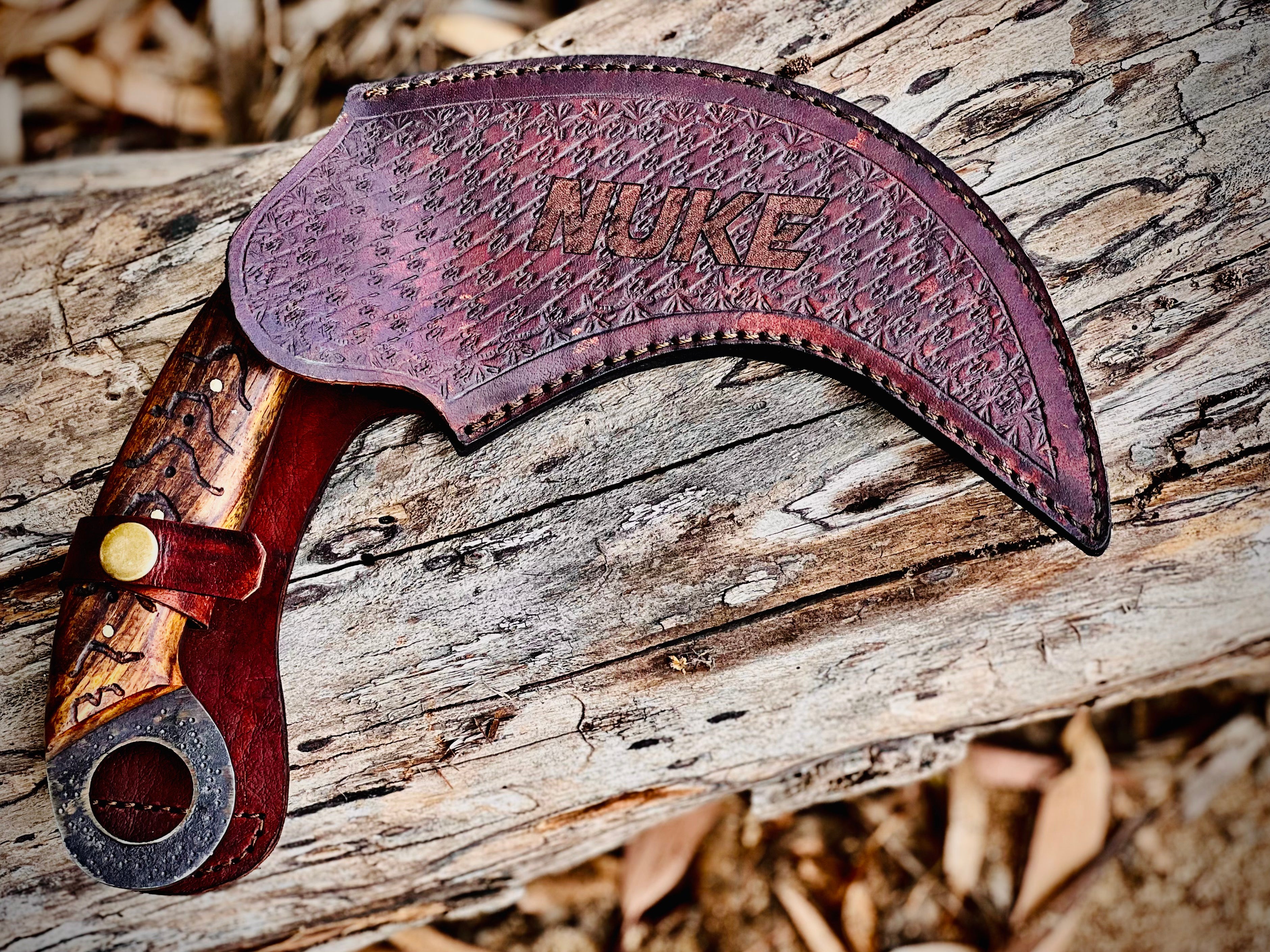 Forged karambit utility knife with wood handle and saw-tooth spine