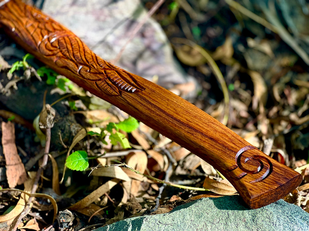 Ravenwood engraved display axe with carved raven-motif haft