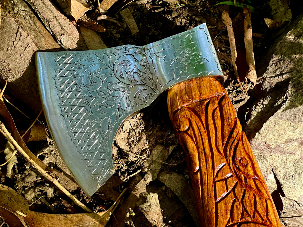 Ravenwood engraved display axe with carved raven-motif haft
