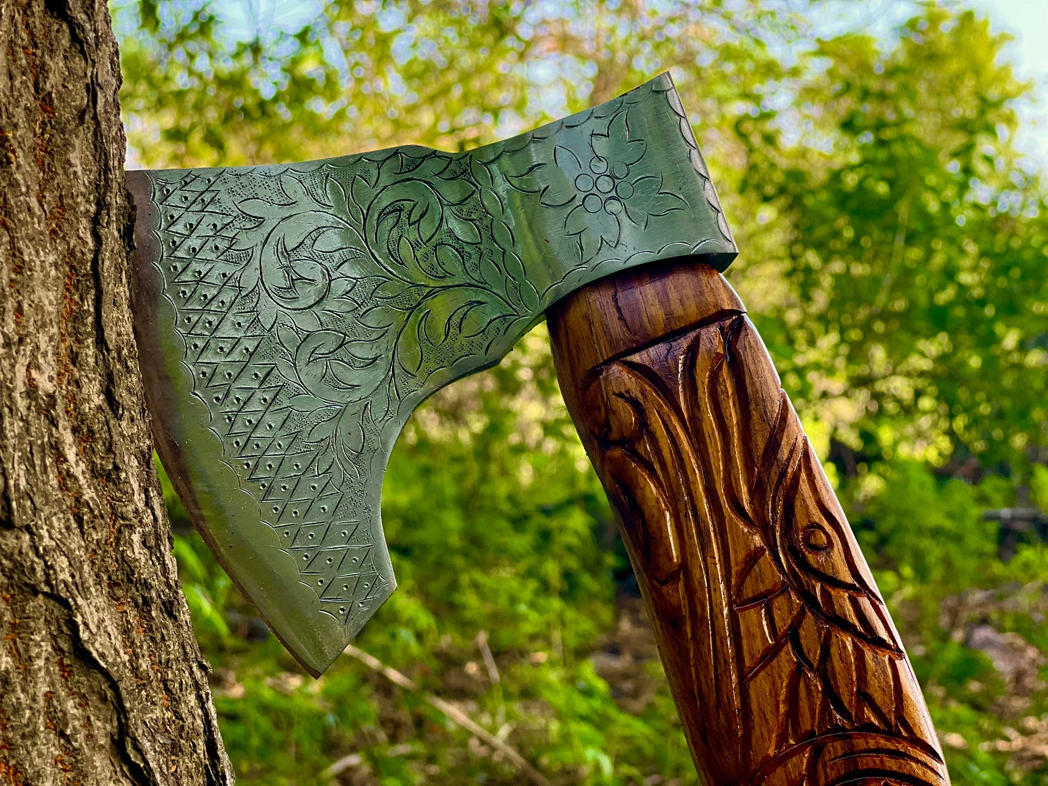 Ravenwood engraved display axe with carved raven-motif haft