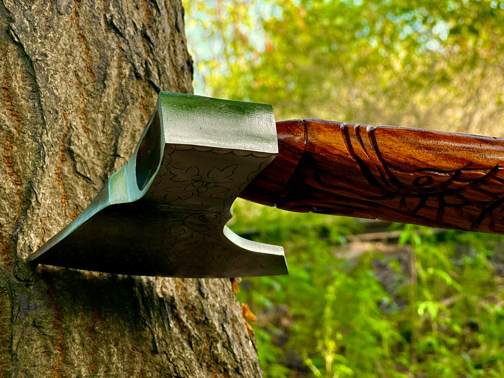 Ravenwood engraved display axe with carved raven-motif haft