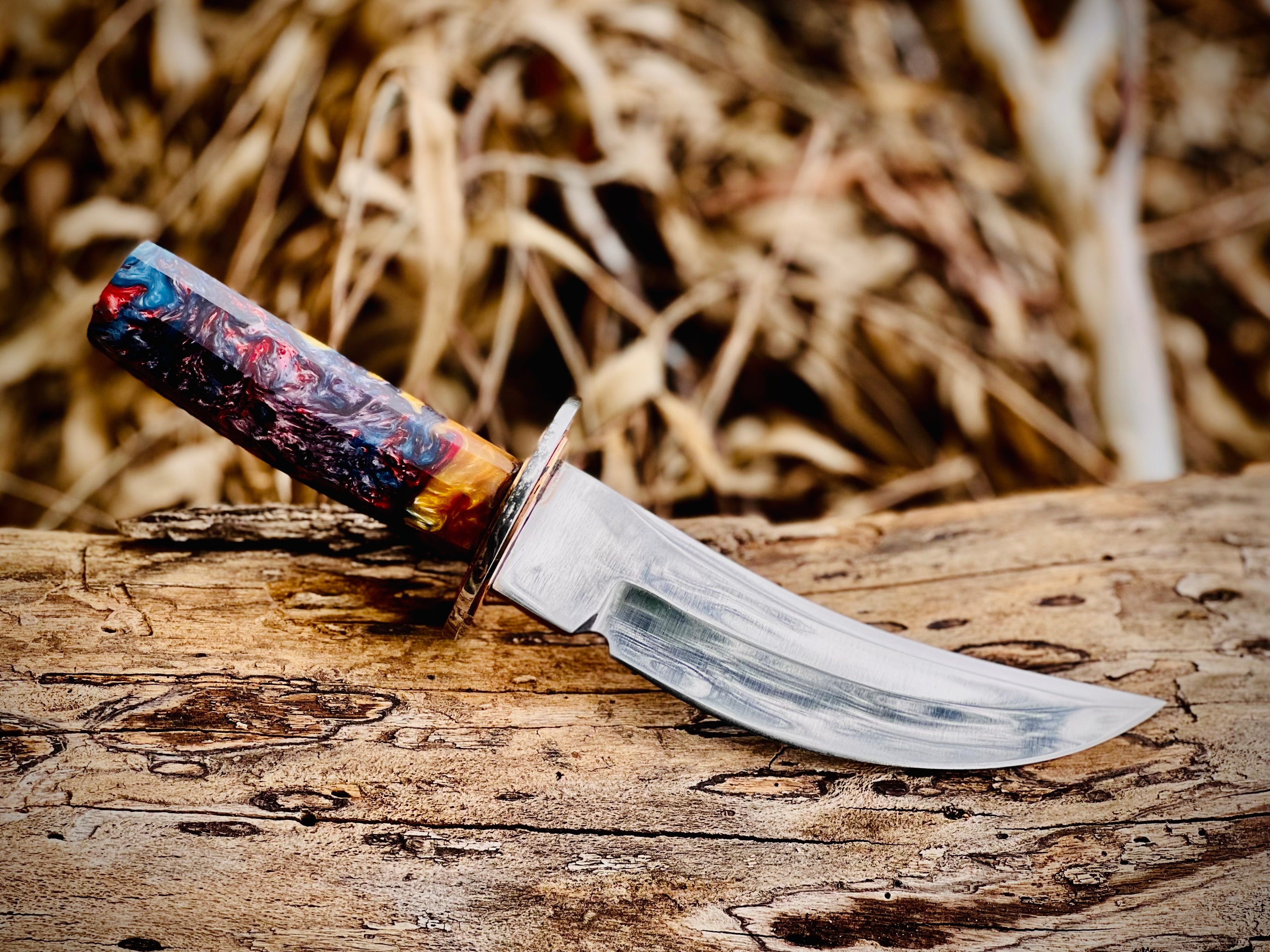 Wildfire Damascus skinning knife with multicolour resin handle