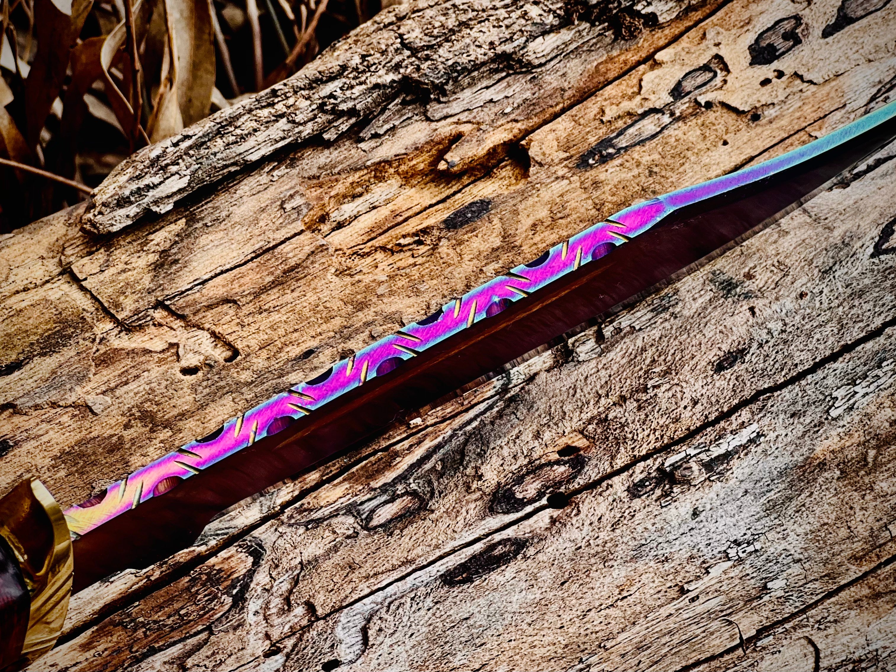 Hand-forged bowie knife with cord-wrapped handle and brass guard