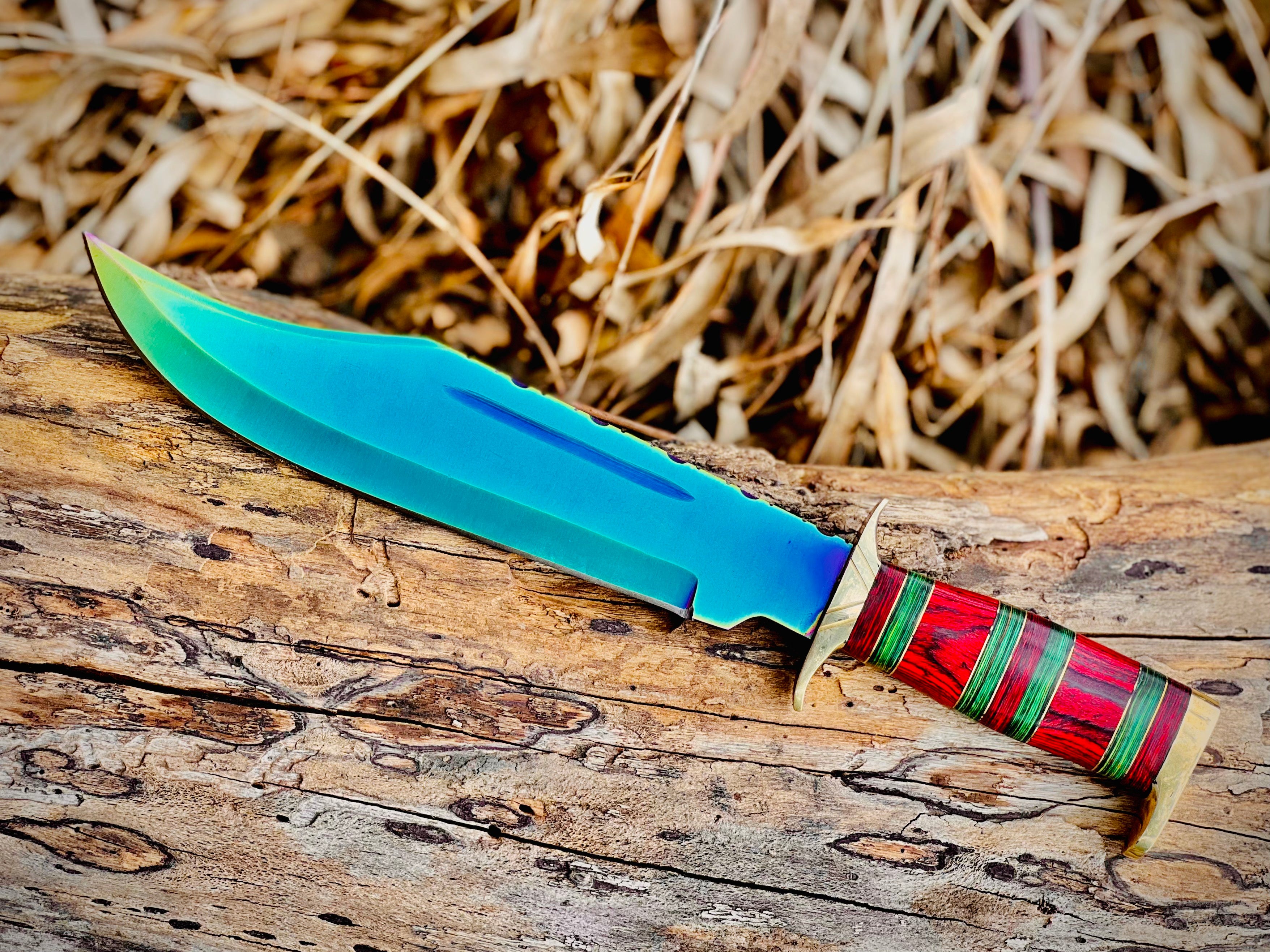Hand-forged bowie knife with cord-wrapped handle and brass guard