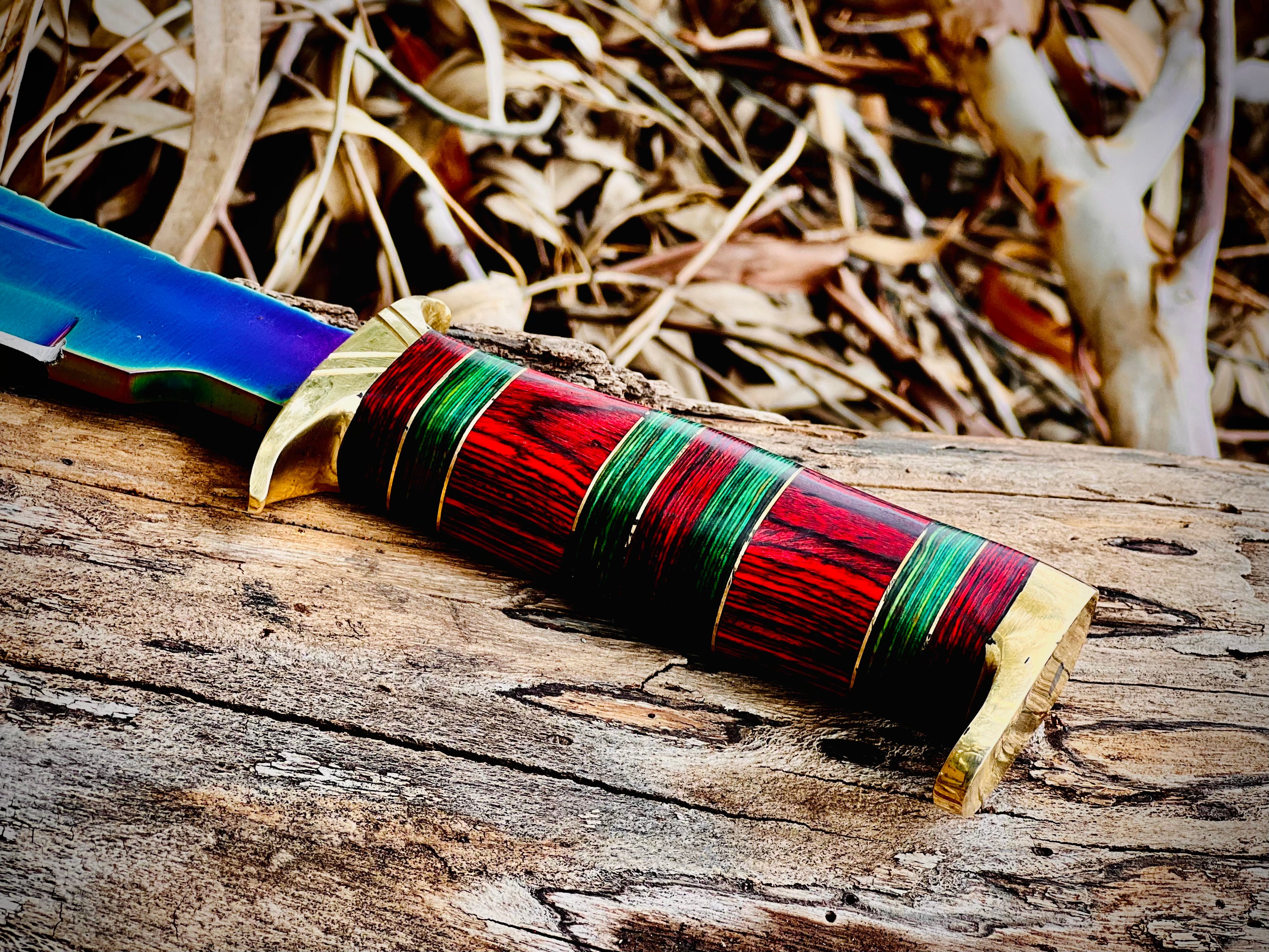 Hand-forged bowie knife with cord-wrapped handle and brass guard
