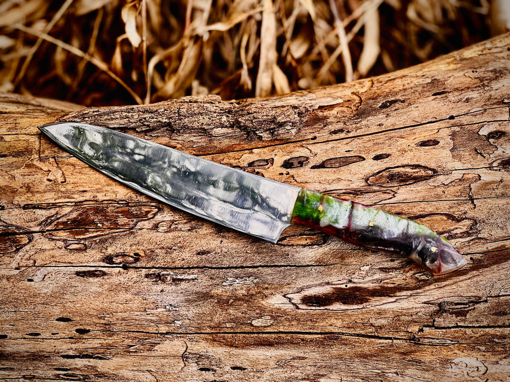 Forged chef knife with emerald swirl resin handle