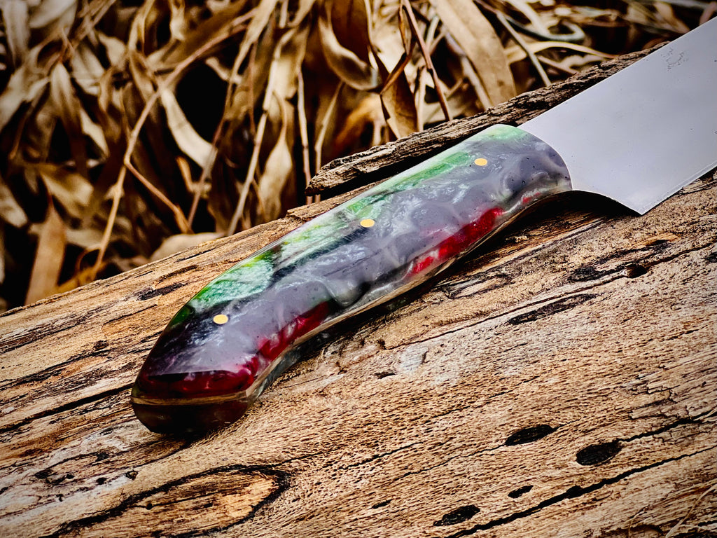 Forged chef knife with emerald swirl resin handle