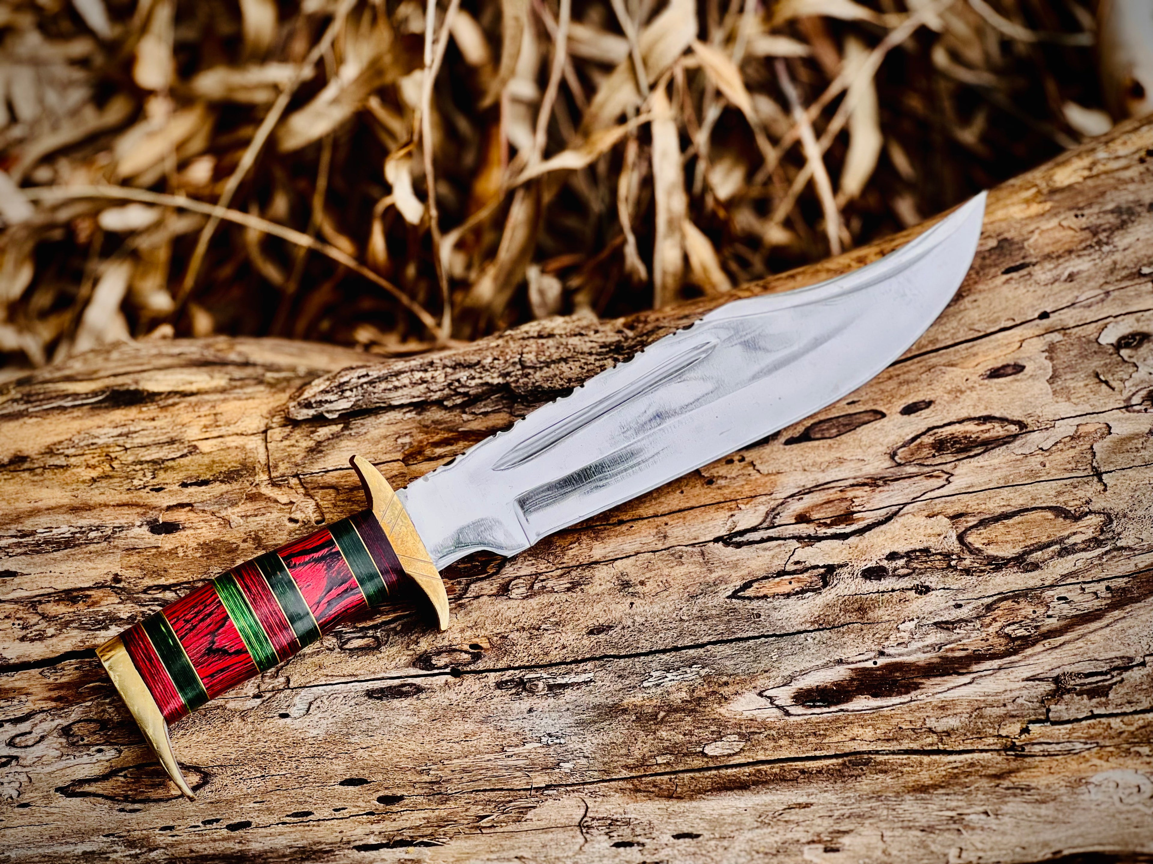 Hand-forged bowie knife with cord-wrapped handle and brass guard