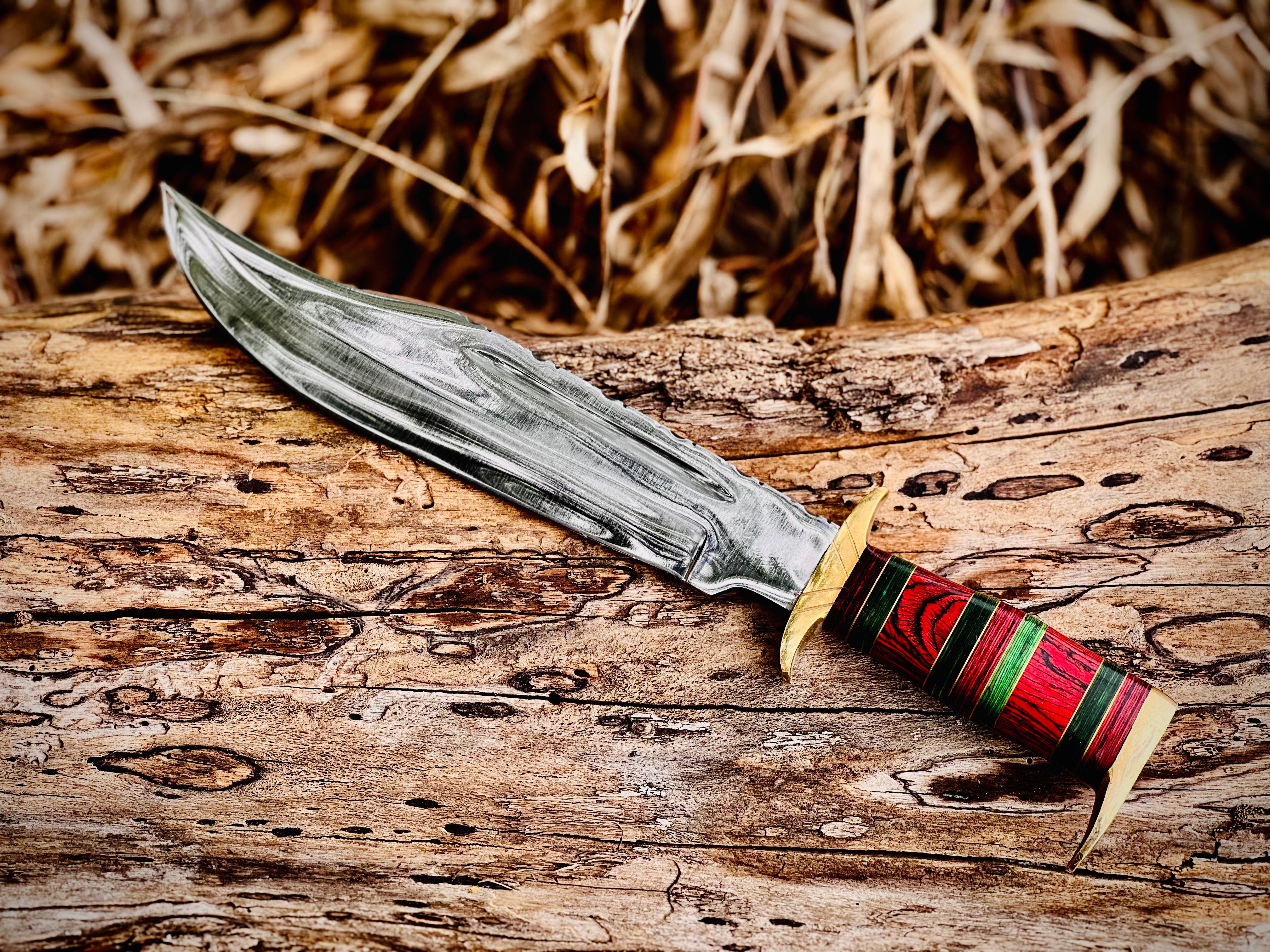 Hand-forged bowie knife with cord-wrapped handle and brass guard