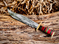 Hand-forged bowie knife with cord-wrapped handle and brass guard