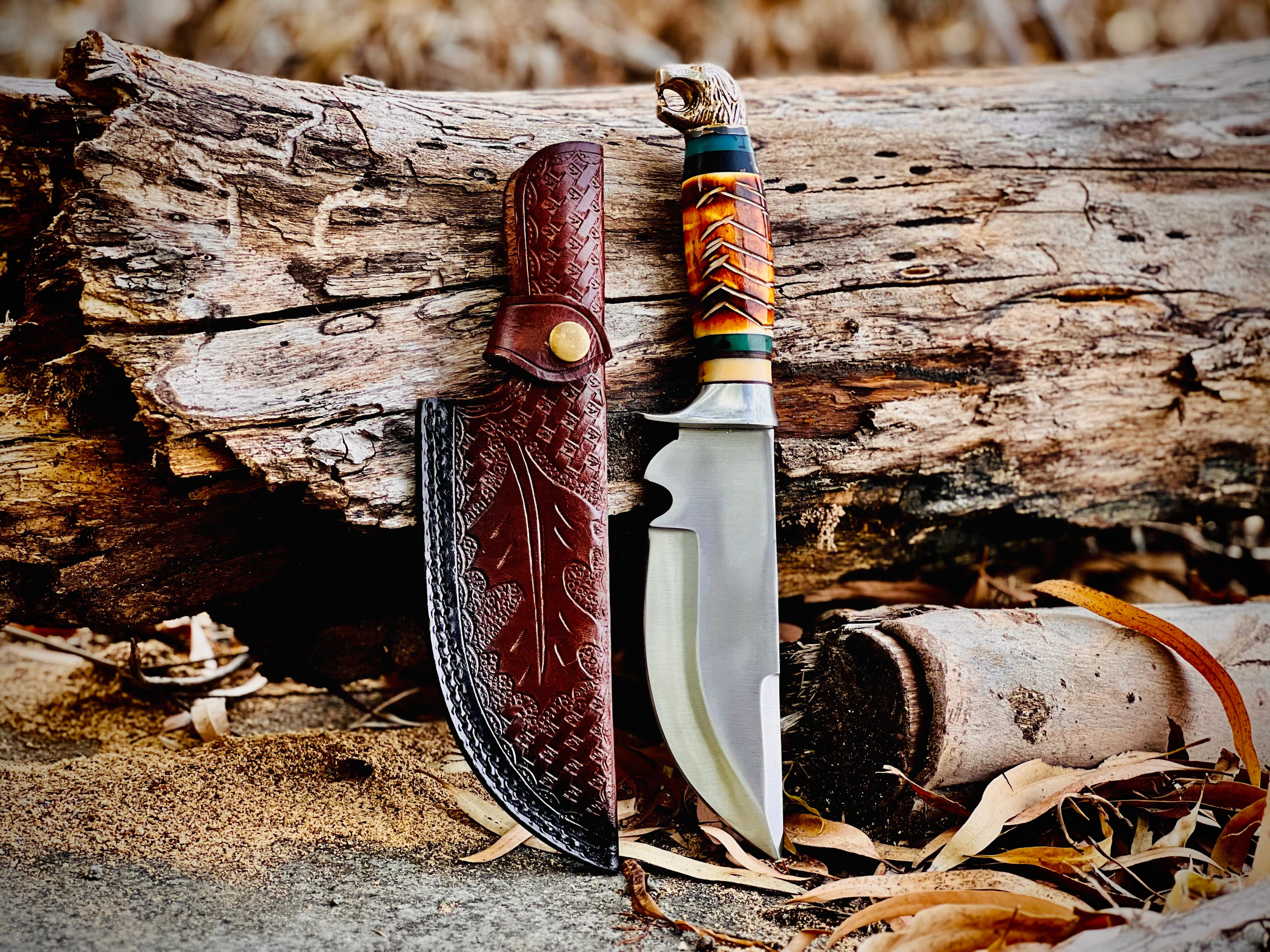 Trailwoven skinner knife with gut hook and leather-laced handle