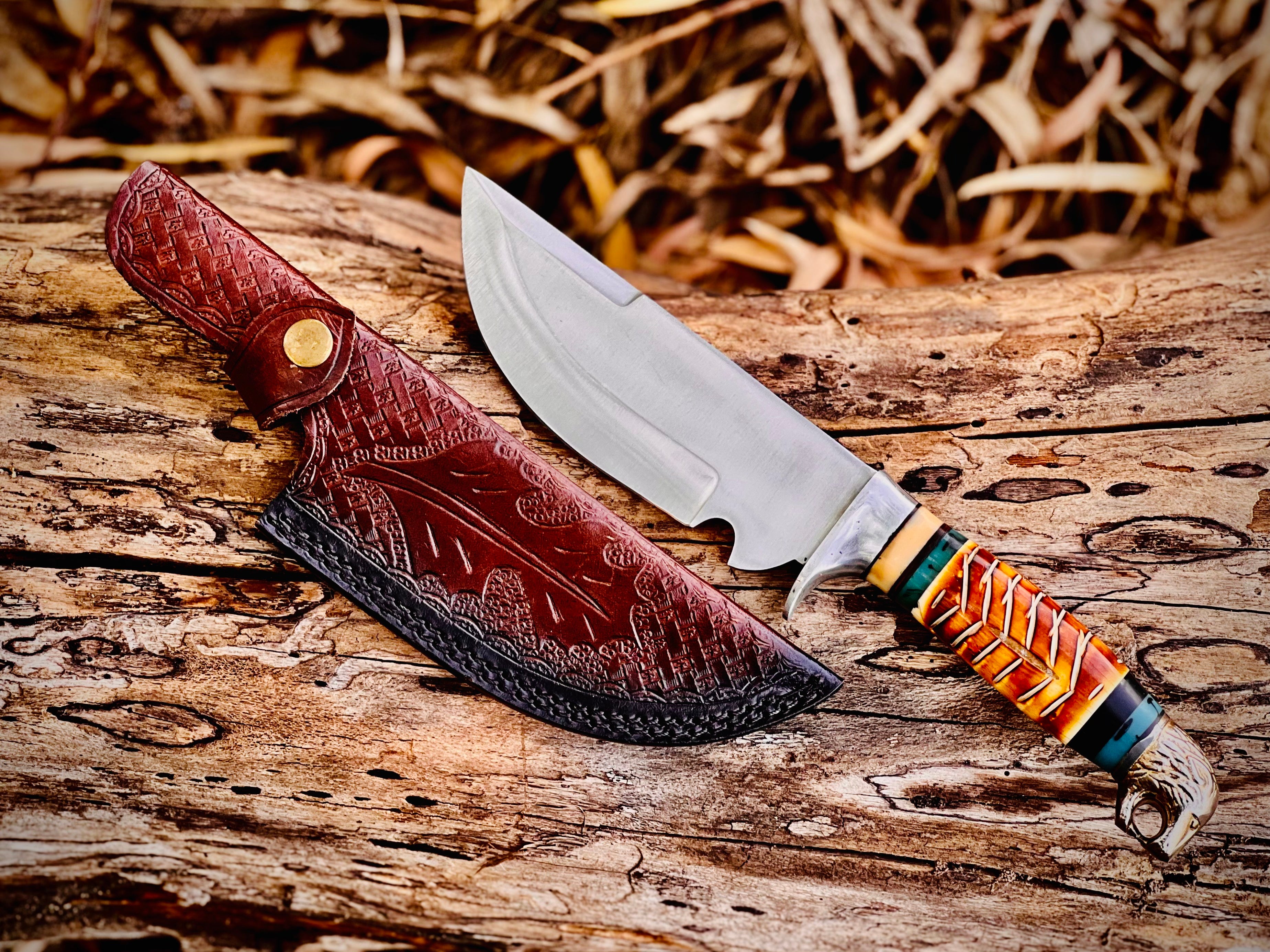 Trailwoven skinner knife with gut hook and leather-laced handle