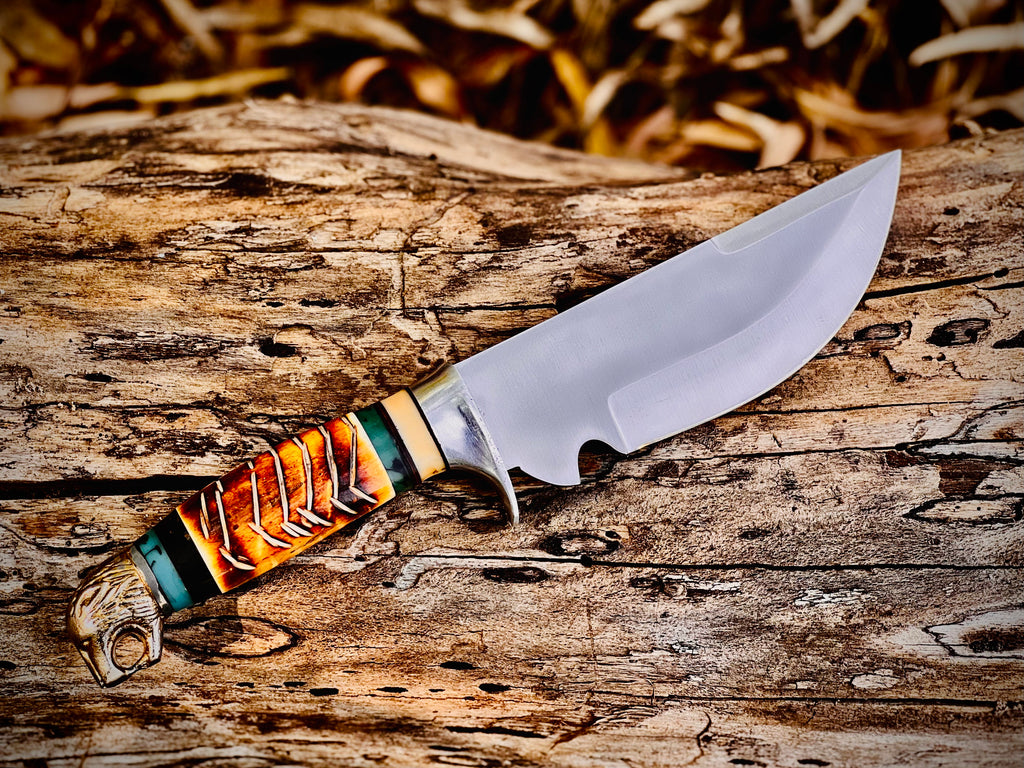 Trailwoven skinner knife with gut hook and leather-laced handle