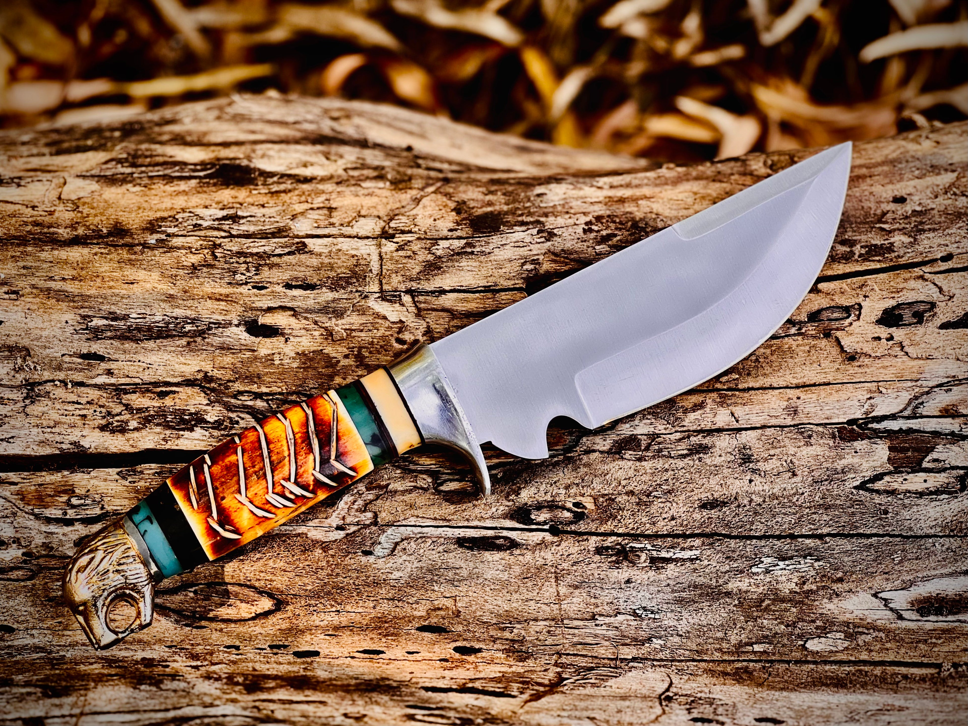 Trailwoven skinner knife with gut hook and leather-laced handle
