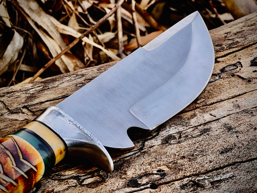 Trailwoven skinner knife with gut hook and leather-laced handle