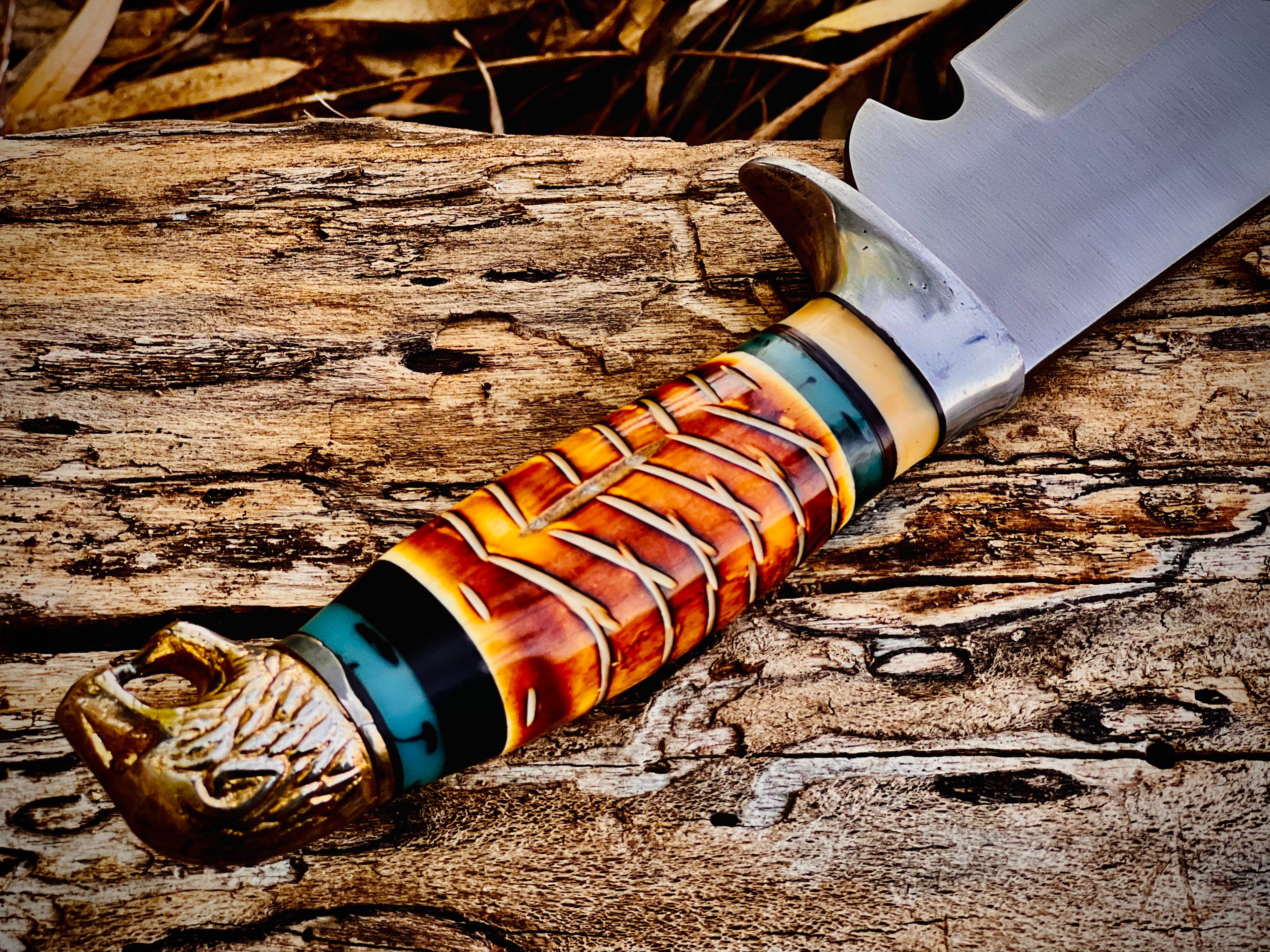 Trailwoven skinner knife with gut hook and leather-laced handle