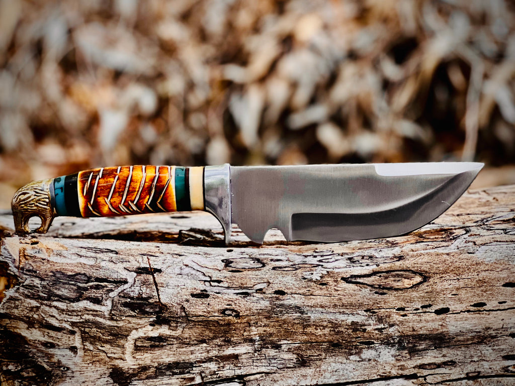 Trailwoven skinner knife with gut hook and leather-laced handle