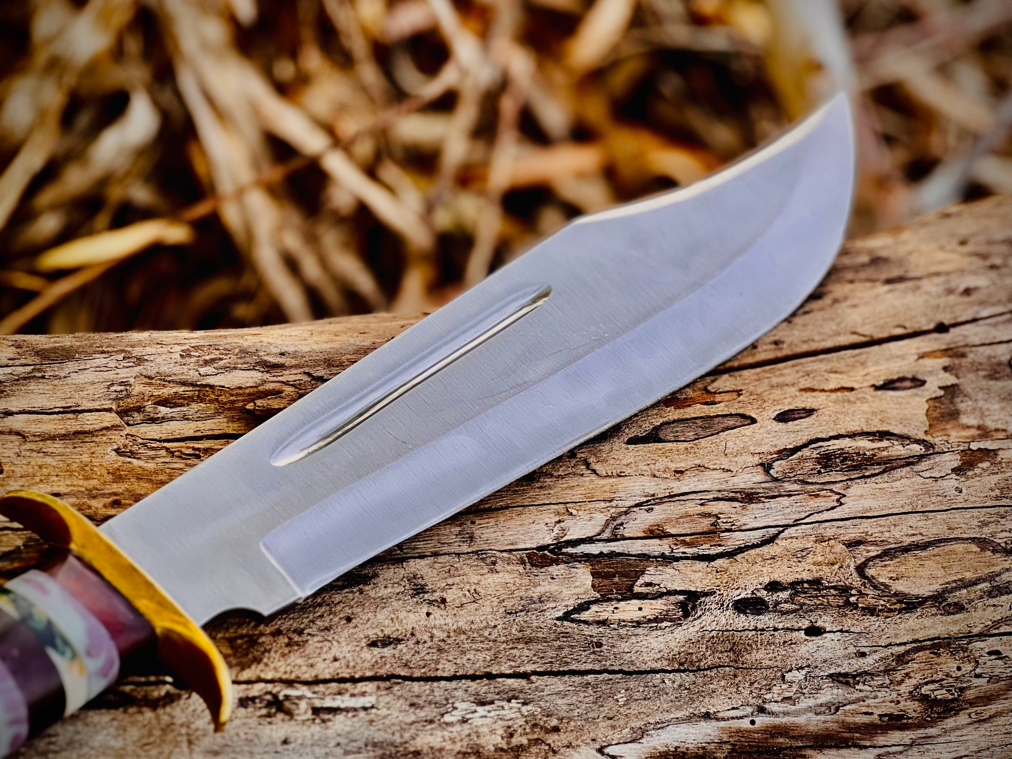 Painted Desert bowie knife with stacked multicolour spacer handle