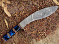 Hand-forged Damascus kukri knife with recurved blade