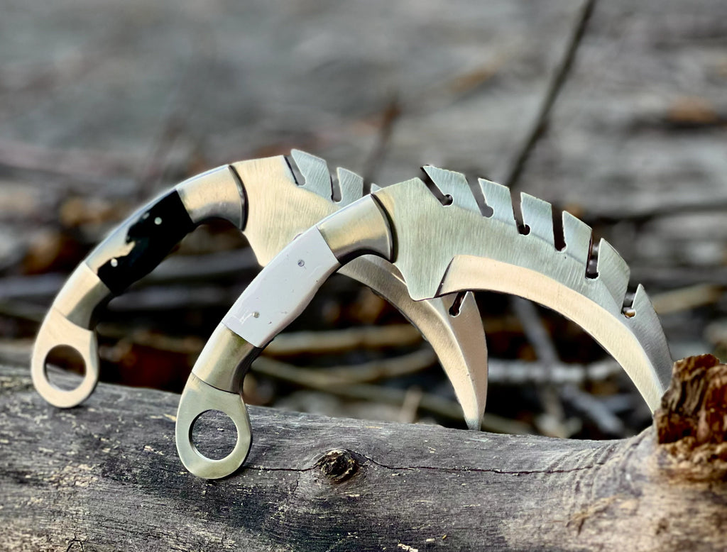 Forged saw-tooth karambit knife with camel bone and buffalo horn handles