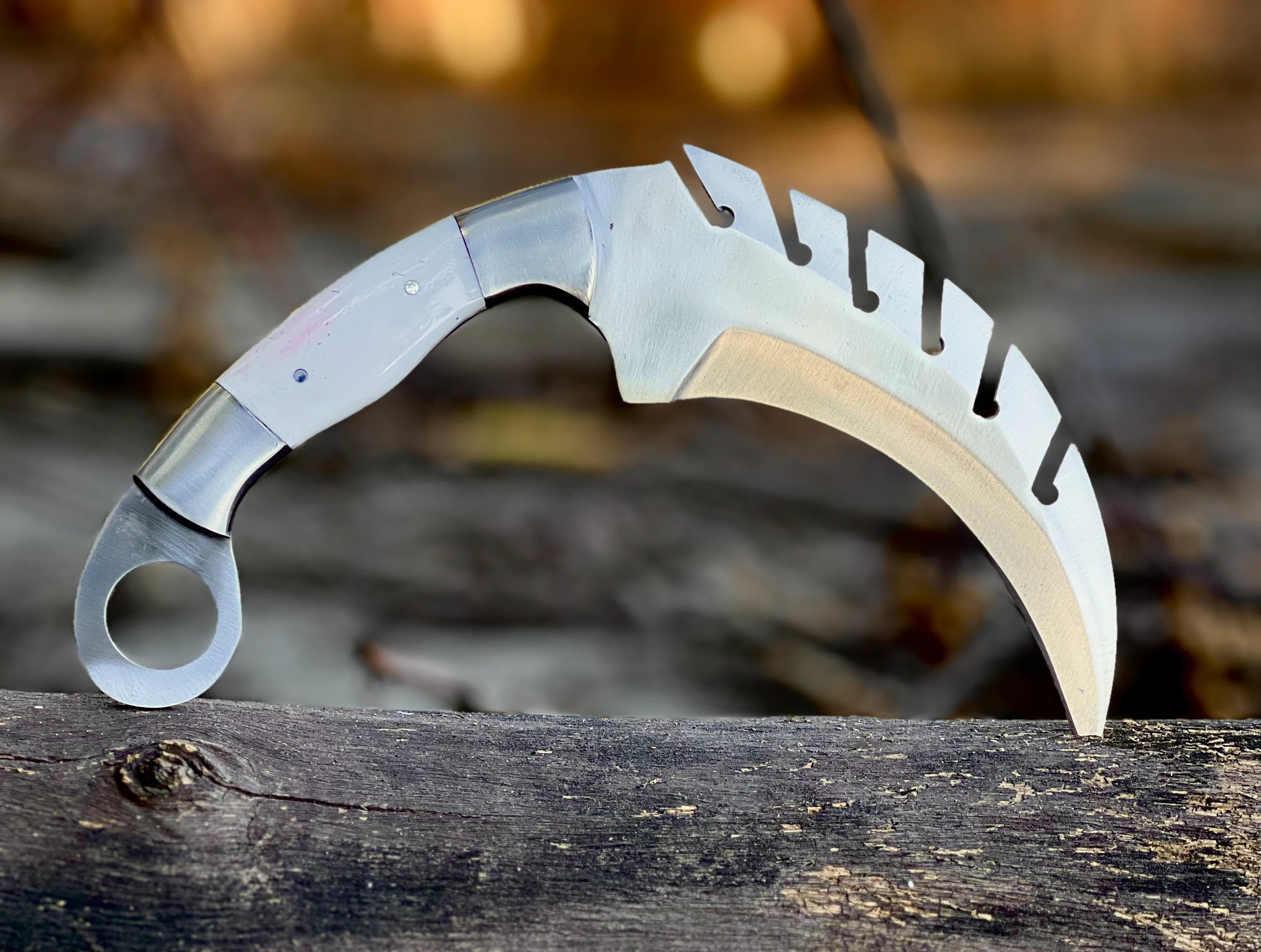 Forged saw-tooth karambit knife with camel bone and buffalo horn handles